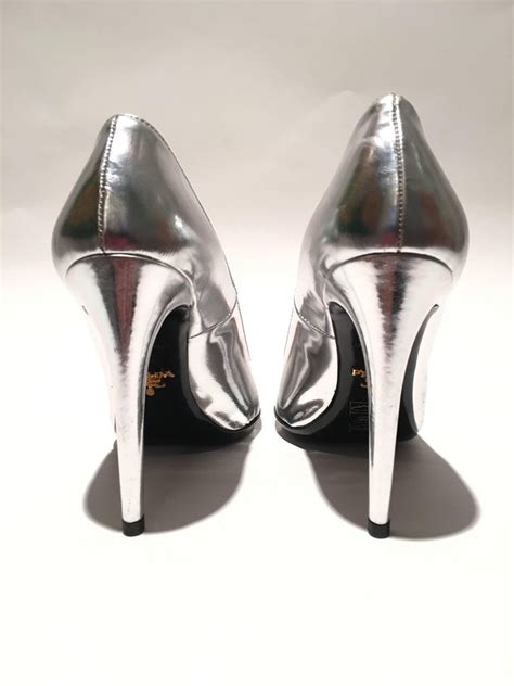 silver heels prada